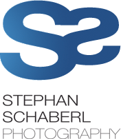 Blaues und schwarzes Logo mit stilisiertem "S" und dem Wort "superuser".