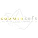 Logo mit Text "SOMMERLoft, Lebensart trifft Strandkultur" und stilisiertem Papierboot im Hintergrund.