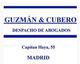Texto de una placa: "GUZMÁN & CUBERO DESPACHO DE ABOGADOS, Capitán Haya, 55, MADRID".