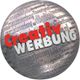 Kugel mit Texten, zentrale Aufschrift "Creativ WERBUNG" in Rot und Grau, umgeben von anderen Wörtern.