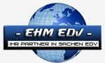 Logo mit Text "EHM EDV" und "Ihr Partner in Sachen EDV" vor einem Globus-Hintergrund.