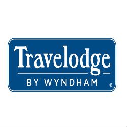 Travelodge by Wyndham logo in white on a blue rectangular background.