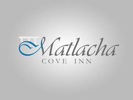 "Matlacha Cove Inn logo with blue wave and grey text on a light grey background."