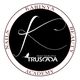 Logo rotondo Karinya Beauty Academy con la scritta "Trust Your Style Truscada" al centro.