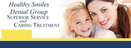 Smiling woman and child next to "Healthy Smiles Dental Group" text.