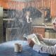 Man reads newspaper under indoor rain, with a mug on the table and a person holding an umbrella.