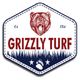 Logo with a bear, "Grizzly Turf" in red, grass silhouette, stars, and a paw print at the bottom.