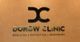 Logo der Dorow Clinic, mit den Worten "Medicine", "Esthetics" und "Dentistry" auf beigem Hintergrund.