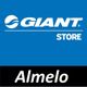 Blauw logo met de tekst "Giant Store" en "Almelo" onderaan in zwart vlak.