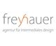 Logo der Agentur Freyhauer für intermediales Design, Text in Grau und Orange auf weißem Hintergrund.