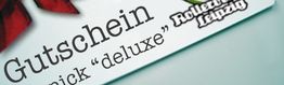 Gutschein mit Aufschrift "deluxe" und Logo von Rollerverleih Leipzig.