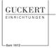 Logo von Guckert Einrichtungen, seit 1972, in schwarzem Text auf weißem Hintergrund.