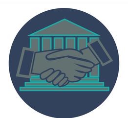 Handshake in front of a building with columns, representing cooperation or partnership.