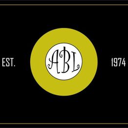 Logo with "ABL" in a circle, "EST. 1974" on sides, black background.