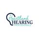 Logo of Heartland Hearing Professionals with an ear shape in the background.
