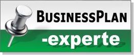 Text "BusinessPlan-Experte" mit einer Reißzwecke auf grünem Hintergrund.