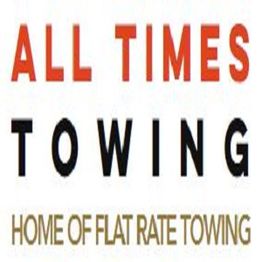 "All Times Towing logo with the tagline 'Home of Flat Rate Towing' in bold letters."