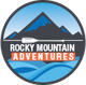 Logo with mountains, an oar, and the text "Rocky Mountain Adventures" over blue waves.