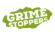 Green logo with the text "Grime Stoppers" in a bold, distressed font.
