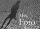Schatten einer Person auf Kopfsteinpflaster mit den Worten "Mrs. Foto, November 2008".