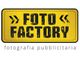 Logo giallo e nero con il testo "Foto Factory" e "fotografia pubblicitaria" in basso.