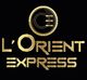 Logo doré sur fond noir avec texte "L'Orient Express" et cercle stylisé en haut.