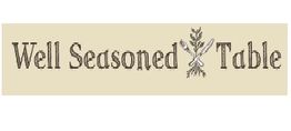 "Well Seasoned Table" text with fork, spoon, and herb graphic on a beige background.