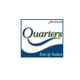 Logo of Quarters Inn & Suites with a wave design and blue border.
