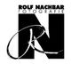 Schwarzes Logo mit großem "N", Text "Rolf Nachbar Fotografie" darüber, und stilisiertem "R".