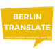 Gelbes Logo mit der Aufschrift: "Berlin Translate - Paris, London, Hamburg, Nantes".
