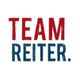 Text "TEAM REITER." in Rot und Blau auf weißem Hintergrund.