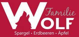 Logo mit Wolfssilhouette und der Aufschrift: "Familie Wolf - Spargel, Erdbeeren, Äpfel".