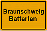 Gelbes Schild mit schwarzem Rahmen, Aufschrift: "Braunschweig Batterien".