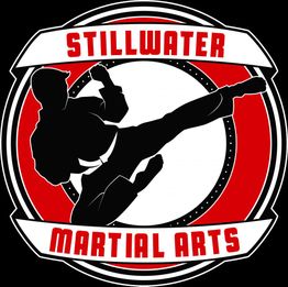 Silhouette of a kicking martial artist in a red and white badge reading "Stillwater Martial Arts."