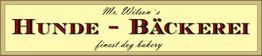 Schild mit der Aufschrift: "Mr. Wilson's Hunde-Bäckerei - finest dog bakery".