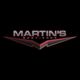 "Logo: Martin's Bodyshop with stylized red and gray winged design on a black background."