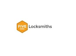 "Logo of Five Towns Locksmiths with a yellow hexagon design."