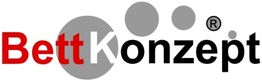 Logo mit Schriftzug "BettKonzept" in Rot und Schwarz, mit grauen Kreisen im Hintergrund.