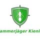Grünes Schild mit Ameise und Schriftzug "Kammerjäger Kienitz" darunter.