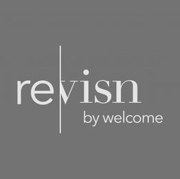 Gray logo with text: "revisn by welcome" separated by a vertical line.
