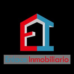 Logotipo colorido de Enlace Inmobiliario con forma de casa en rojo y azul.