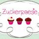 Verschnörkelter Rahmen mit drei Cupcakes und dem Wort "Zuckerpoesie" auf grünem Hintergrund.