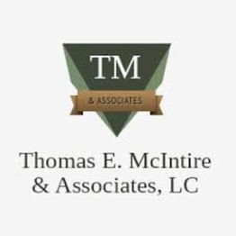 Logo: Green triangle with "TM" and a ribbon below. Text: Thomas E. McIntire & Associates, LC.