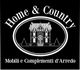 Logo "Home & Country" con casa stilizzata, mobili e complementi d'arredo.