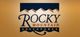 "Rocky Mountain Adventures logo with stylized mountain design on a brown background."
