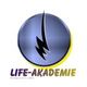 Logo der Life-Akademie mit Blitzsymbol in einem blauen Kreis und gelbem Rand.