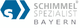 Logo: Blauer Sixkant mit 'S', Text 'Schimmel Spezialist Bayern' in Grau rechts daneben.