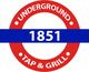 Red circle with "Underground Tap & Grill" and blue bar reading "1851" in the center.