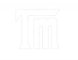 Stylized "TM" logo design with sharp, angular shapes on a white background.