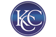 Circular logo with overlapping "KC" letters in white on a blue gradient background.